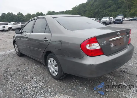 2003 Toyota Camry Le z USA, uszkodzony, nr VIN 4T1BE32K03U697561